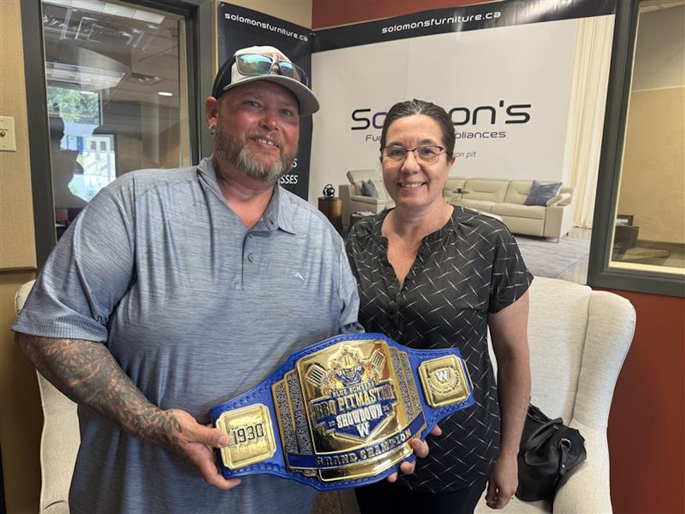 Rob and Brigette Turner win pitmaster championship belt