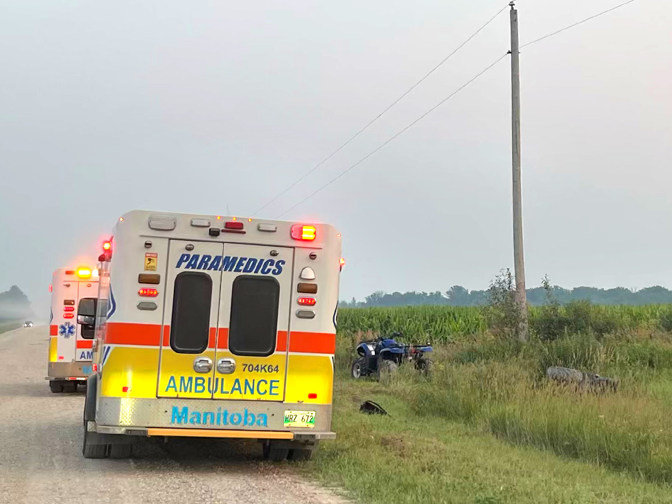 an ambulance on the left, a quad in the middle and a flipped quad on the right