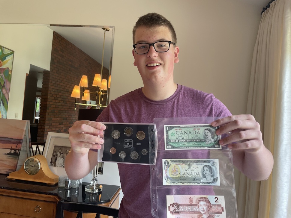 Otto Goertzen with a few pieces from his coin collection