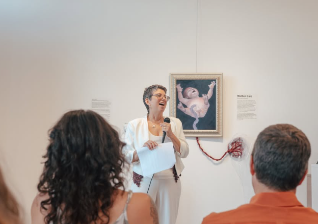 Kelly Klick giving an artist talk at the opening of 'Mother Care' at the 210 Gallery. (Source: 210 Gallery)