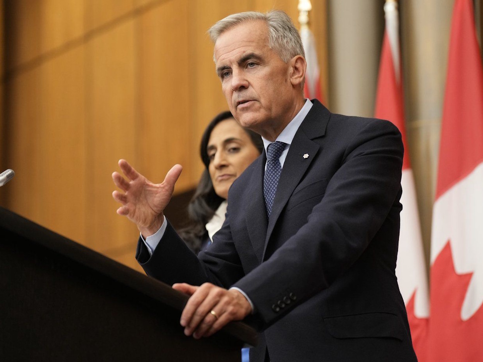 Prime Minister Mark Carney speaks with media during a news conference in Ottawa, Wednesday, July 30, 2025. THE CANADIAN PRESS/Adrian Wyld