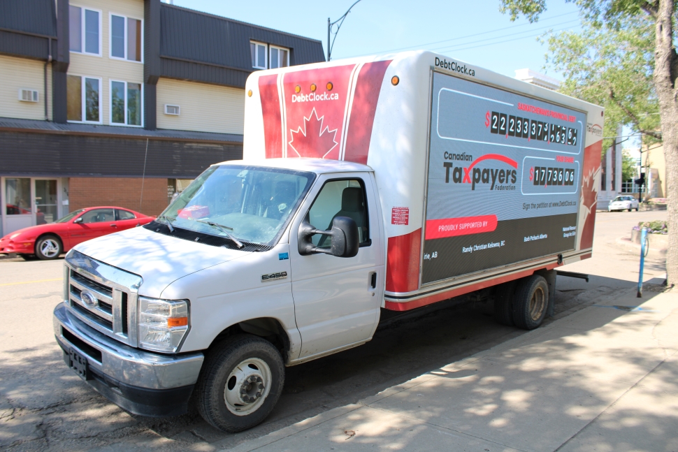 Photo of the Canadian Taxpayers Federation's debt clock, touring the province this summer. 