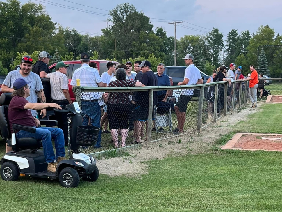 Folks spending time at the ball diamond in Plumas for the evening before Plumas Summer Fun Day. (Photo credit: Allison Dayholos/Facebook)