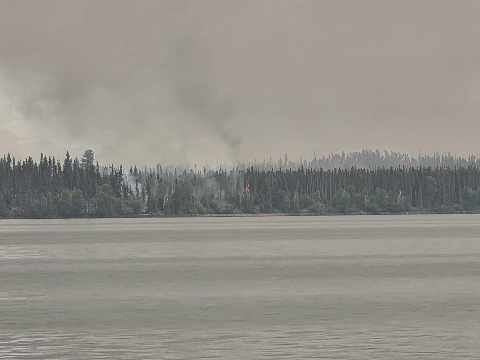 Smoke and fire just off Weyakwin Lake in northern Saskatchewan. (photo by Hayden Michaels)