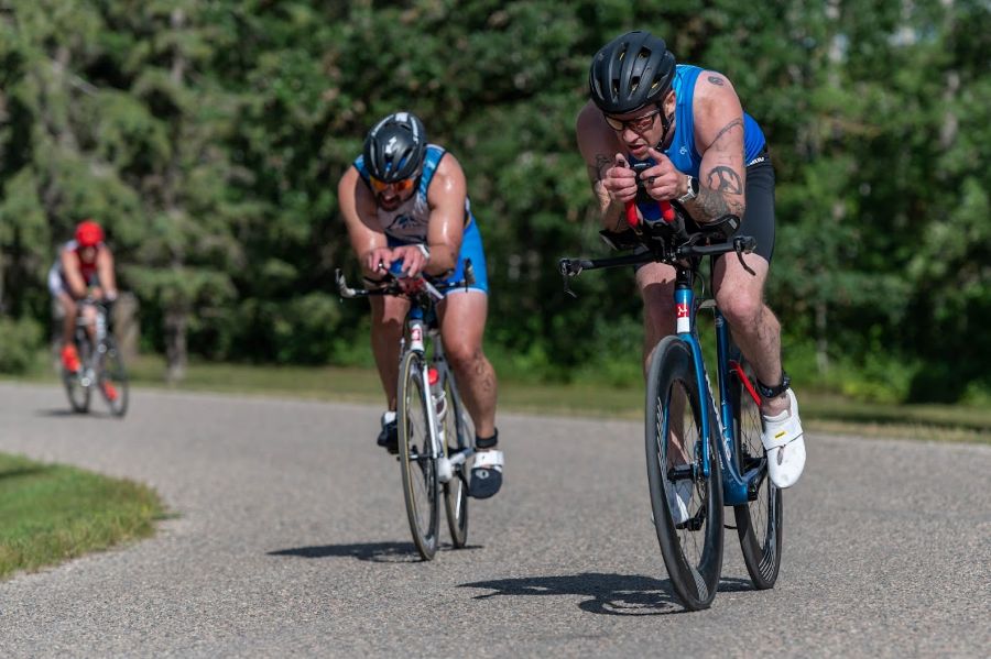three cyclists in a race