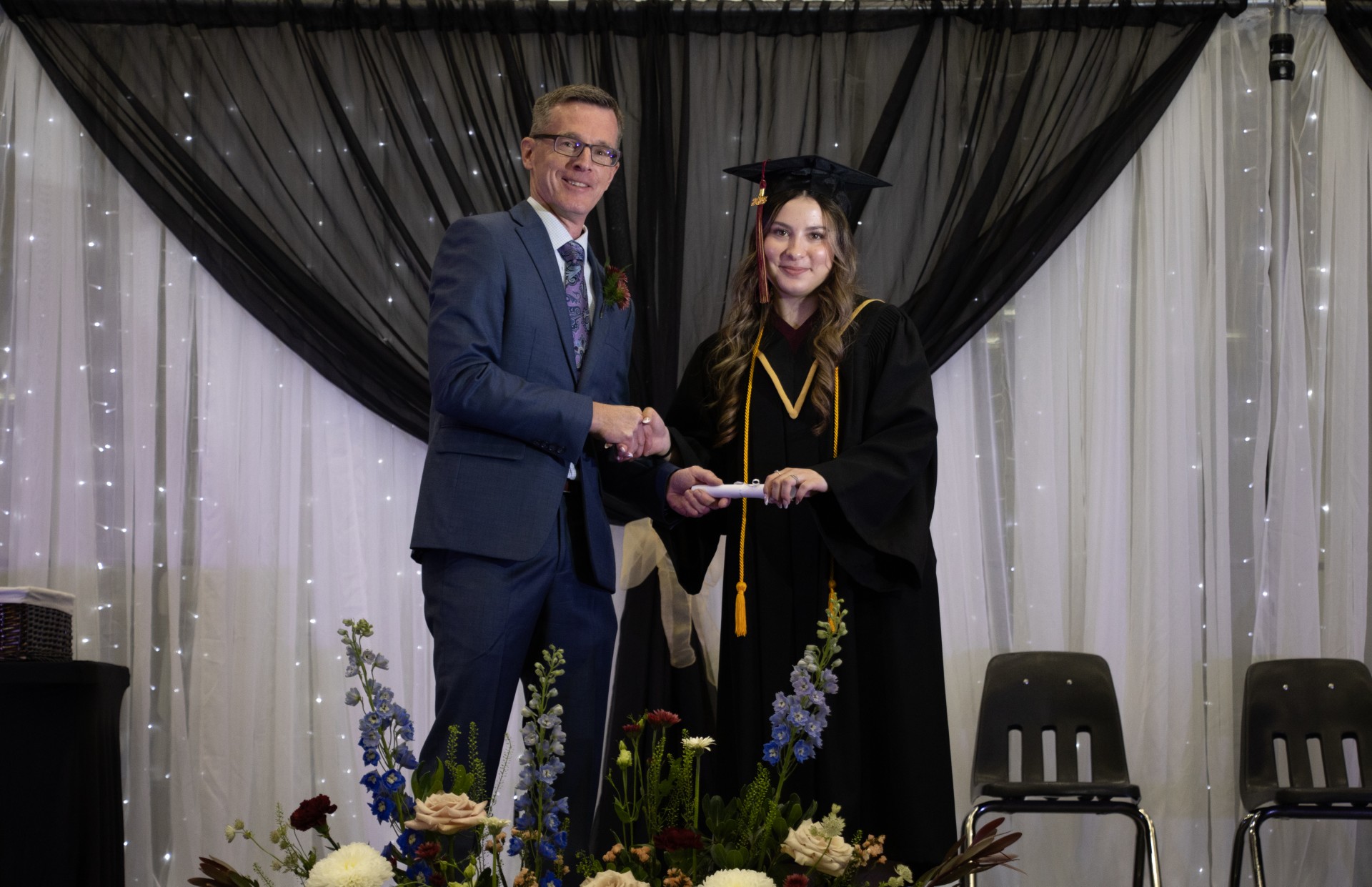 Taylor Klaassen receives her diploma from Portage Collegiate Institute Principal Lawrence McKenzie (Submitted photo)