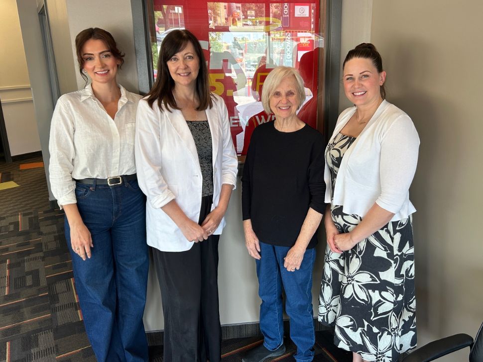 Joy Smith (in the black) with her two daughters Janet Campbell and Alex Cunningham beside her, with Sylvia St. Cyr on the right. 