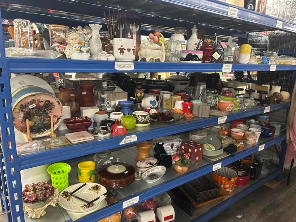 Cups and Knick knacks on sale at thrift store