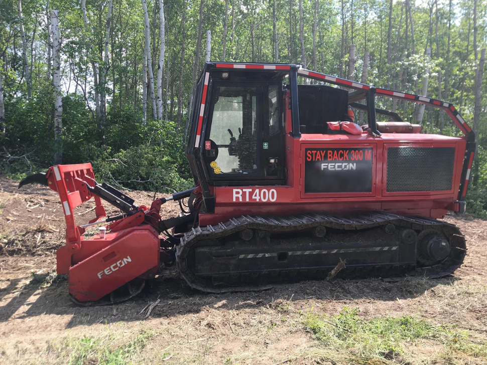 Tractor used to clear vegetation near power lines