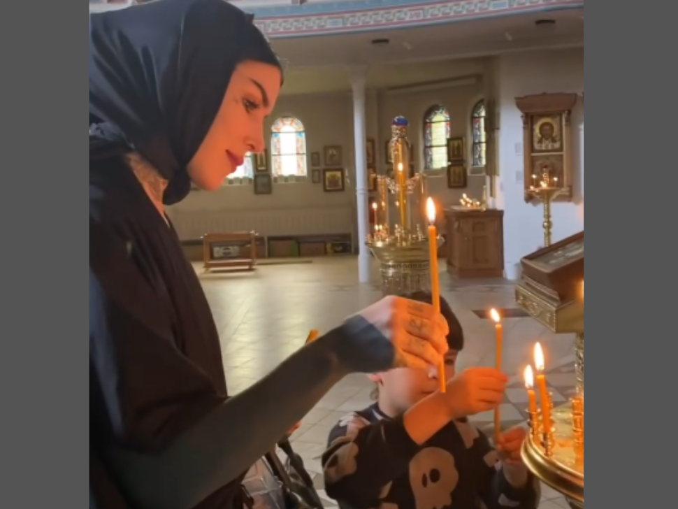 Kat Von D lights a candle in Orthodox Church