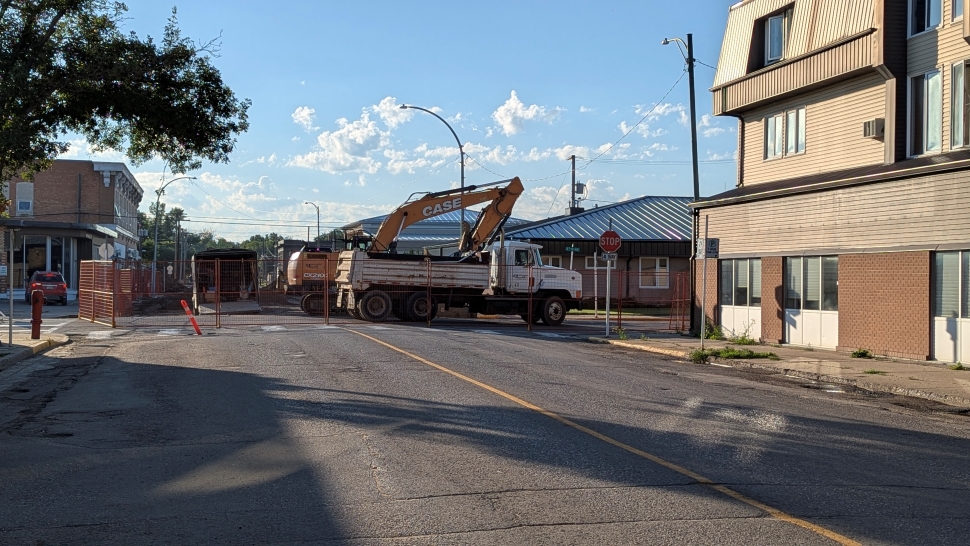 Construction crews working on a city street