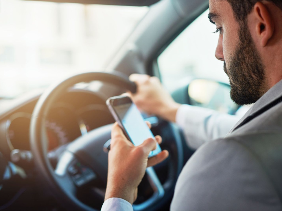 A driver is caught texting behind the wheel — a dangerous distraction that remains one of the leading causes of traffic collisions nationwide. Submitted Photo/CAA