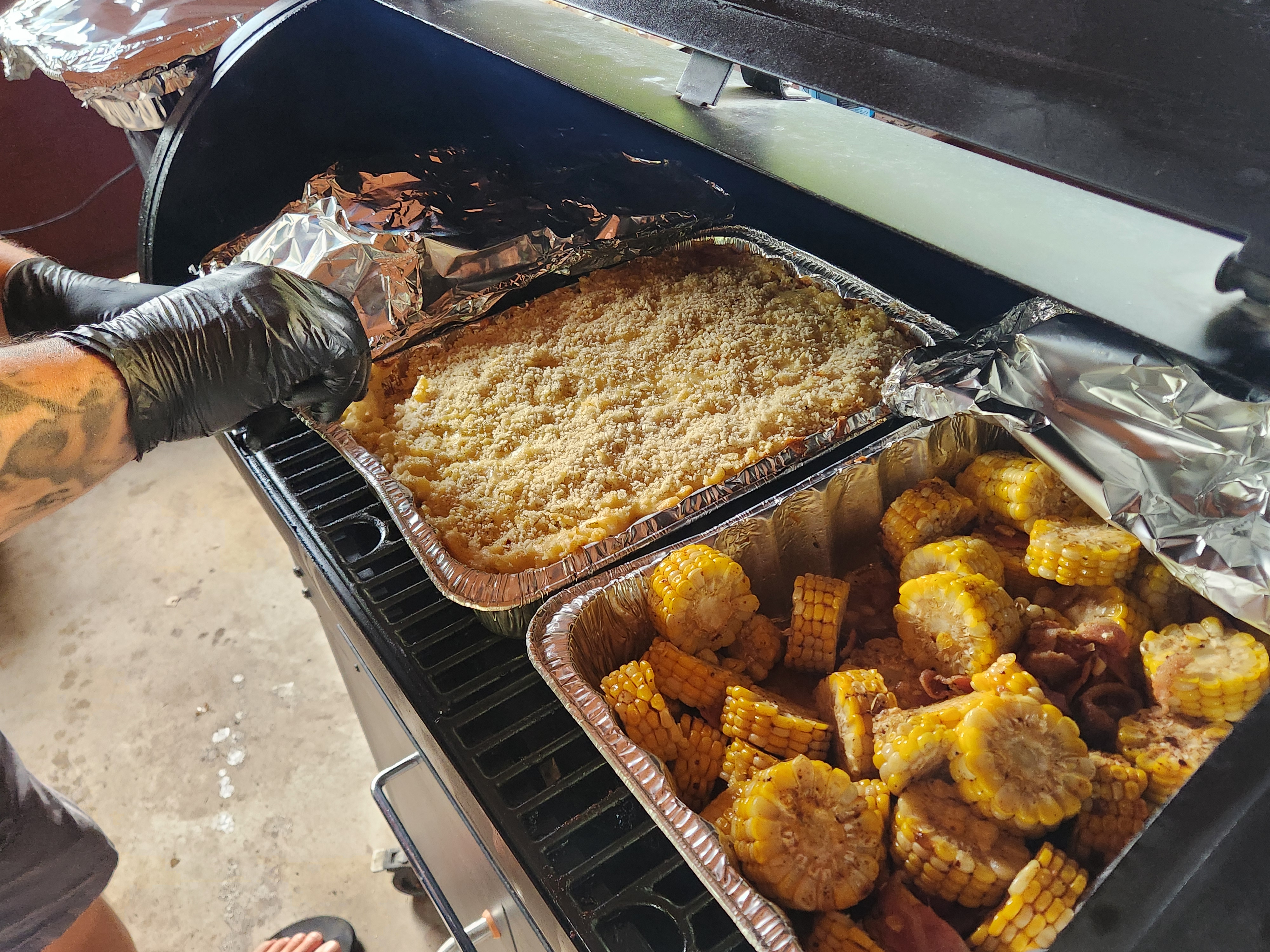 Smoker acution food being cooked and ready to serve.