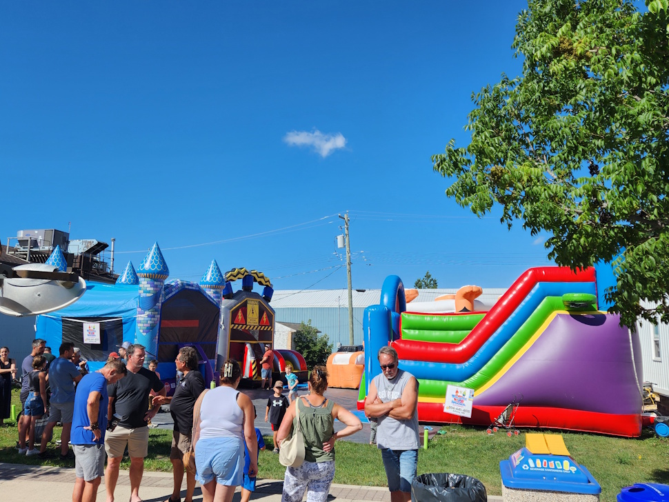 Bouncy castle city it seemed at this two day event, kids were having a blast. parents packed the street waiting.