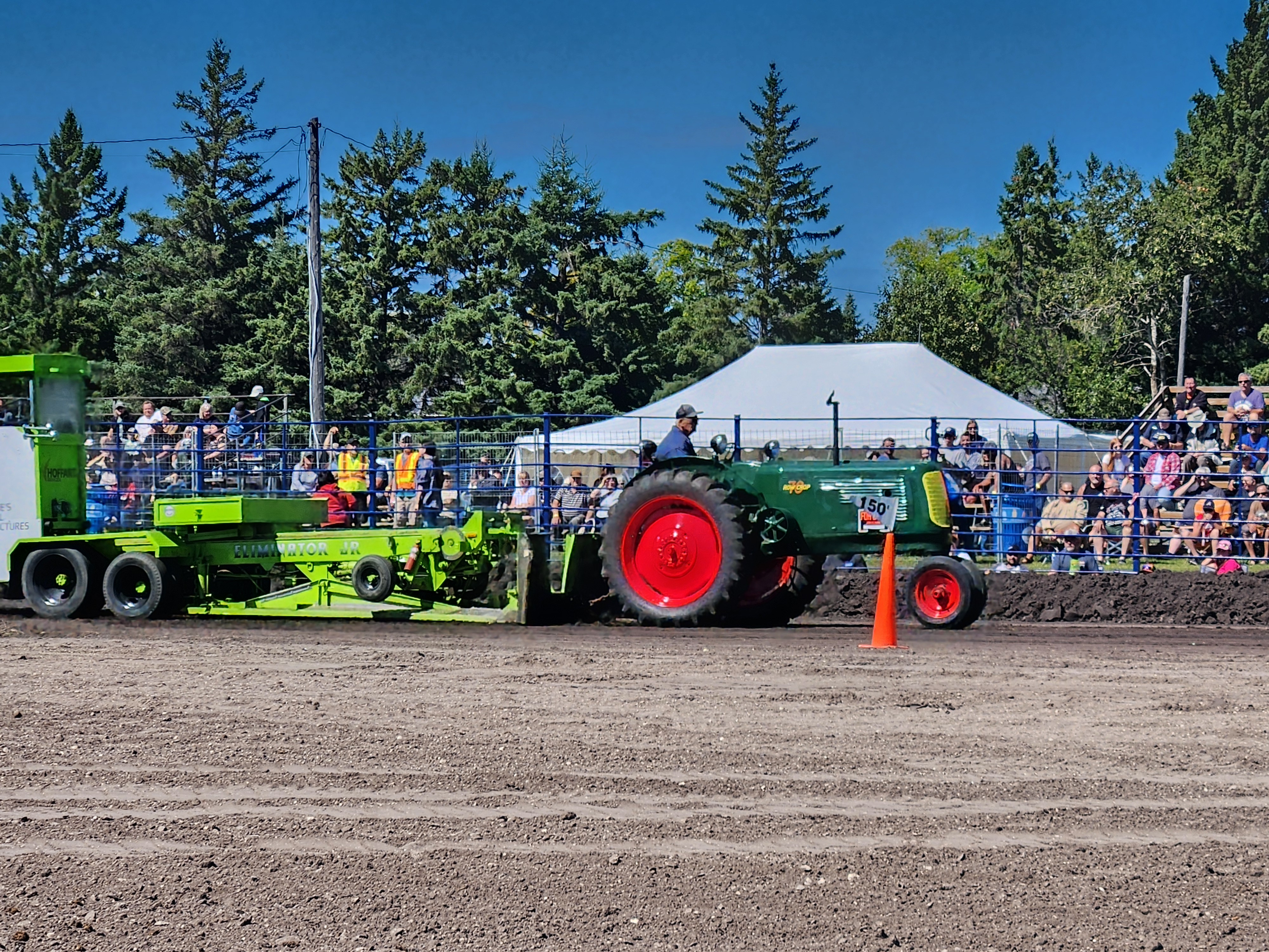 Donald Dufnar, showing how strong his tractor the "Diggin' Deer" really is.    PortageOnline/ Tristen Sokolosky