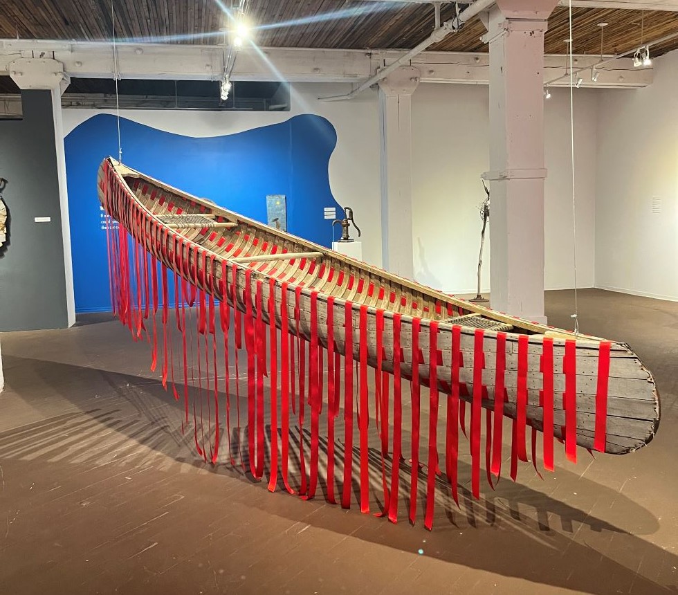 The centrepiece canoe of 'Refuse(d)' at Urban Shaman Gallery. (Supplied)