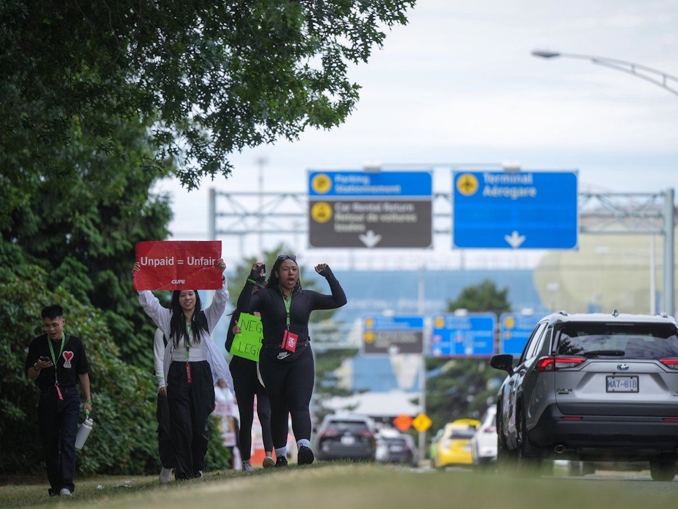 Striking Air Canada flight attendants rally at Vancouver International Airport, in Richmond, B.C., on Monday, Aug. 18, 2025. THE CANADIAN PRESS/Darryl Dyck