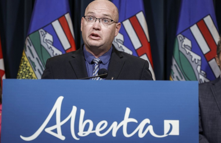 Alberta Minister of Children and Family Services Searle Turton speaks to the media about an E. coli outbreak linked to multiple Calgary daycares surpassing 200 cases in Calgary on Tuesday, Sept. 12, 2023. THE CANADIAN PRESS/Jeff McIntosh