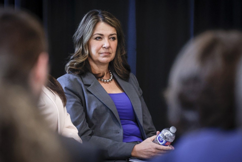Alberta Premier Danielle Smith listens to speakers after announcing the "New North America Initiative," led by the University of Calgary’s School of Public Policy in Calgary on Friday, May 16, 2025. THE CANADIAN PRESS/Jeff McIntosh