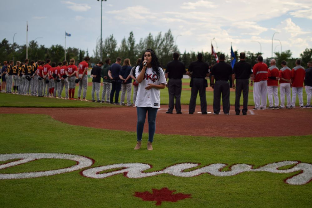 Brettyn Rose singing Oh Canada during last year's WCBL All-Star game. Okotoks Online/Scott Savard