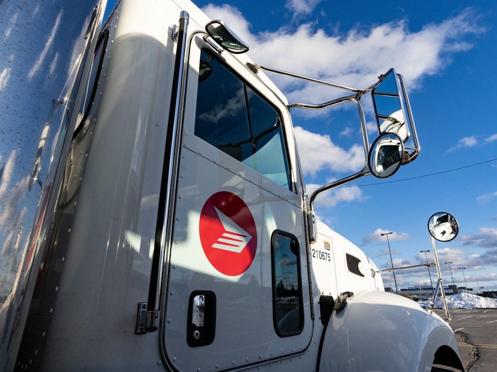 A Canada Post truck is seen at a distribution centre in Montreal on Friday, Dec.13, 2024. THE CANADIAN PRESS/Christinne Muschi