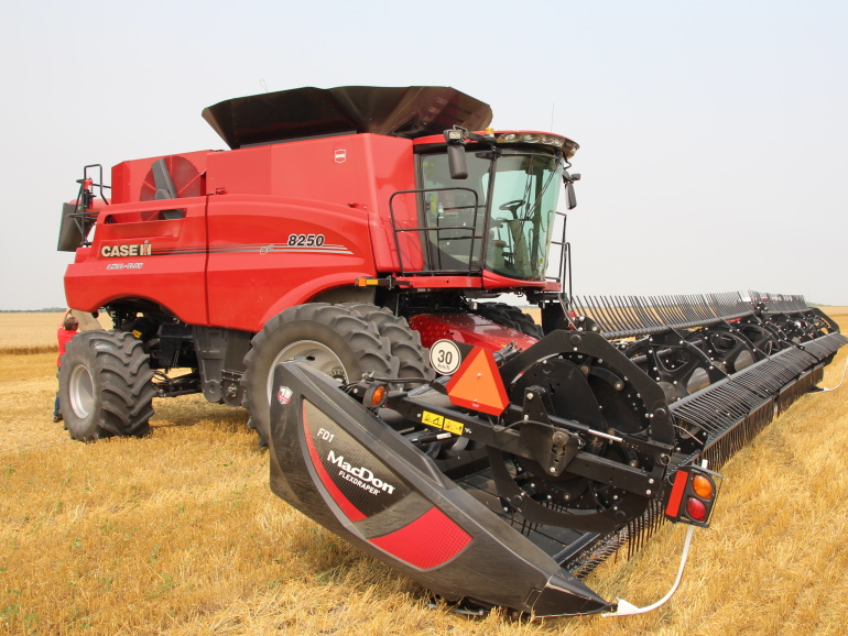 Combine sitting still after harvesting a field