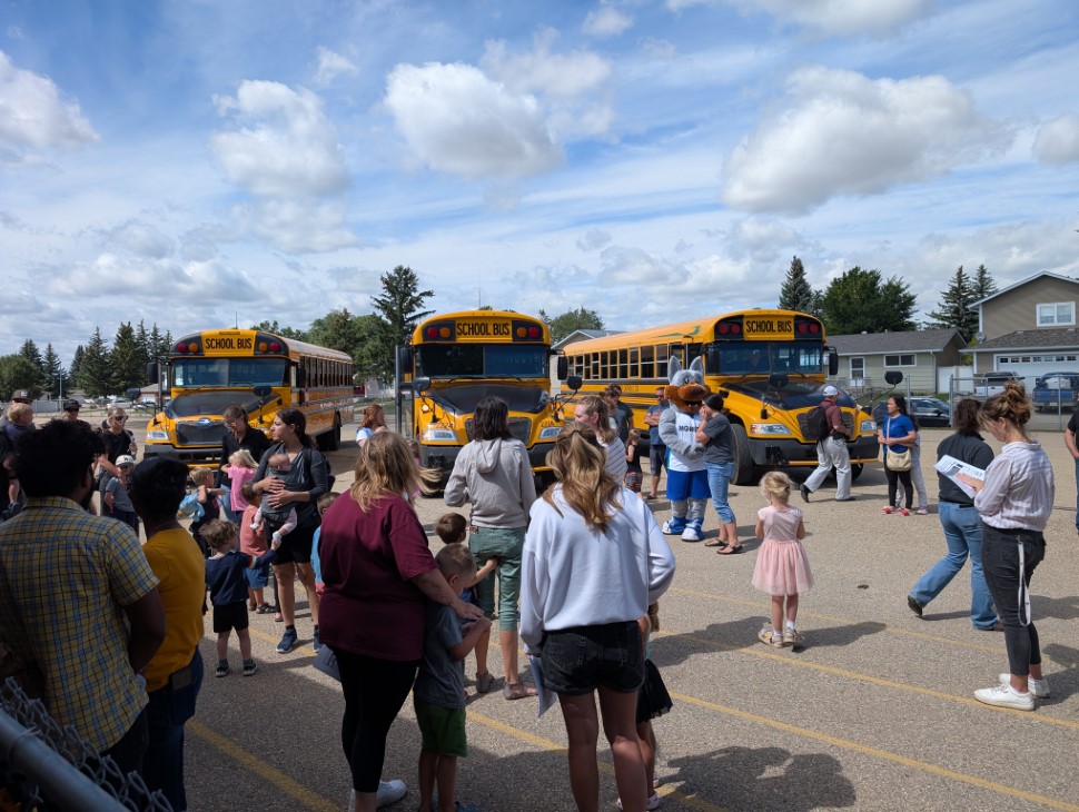 Drivers, teachers, children, parents, school division executives, and MJPS officers gather at Lindale for the annual First Riders Program (photo by Gordon Edgar)