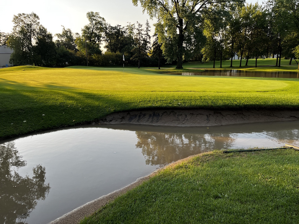 Sand bunkers at Portage Golf Club filled with water after overnight storm and heavy rainfall.