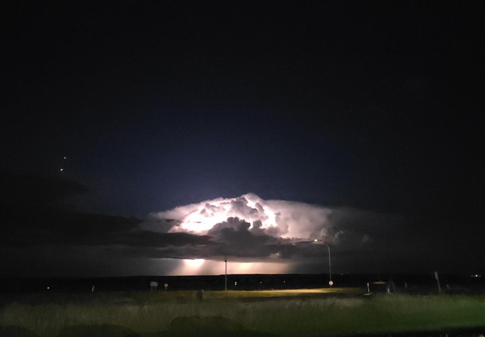 A shot of the storm, flashing with lightning. (photos by Hayden Michaels)