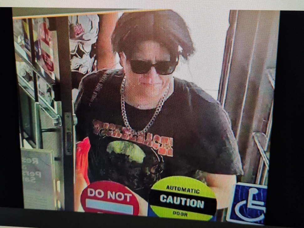 A surveillance camera image showing the suspect wanted in connection with thefts and credit card fraud in Neepawa.