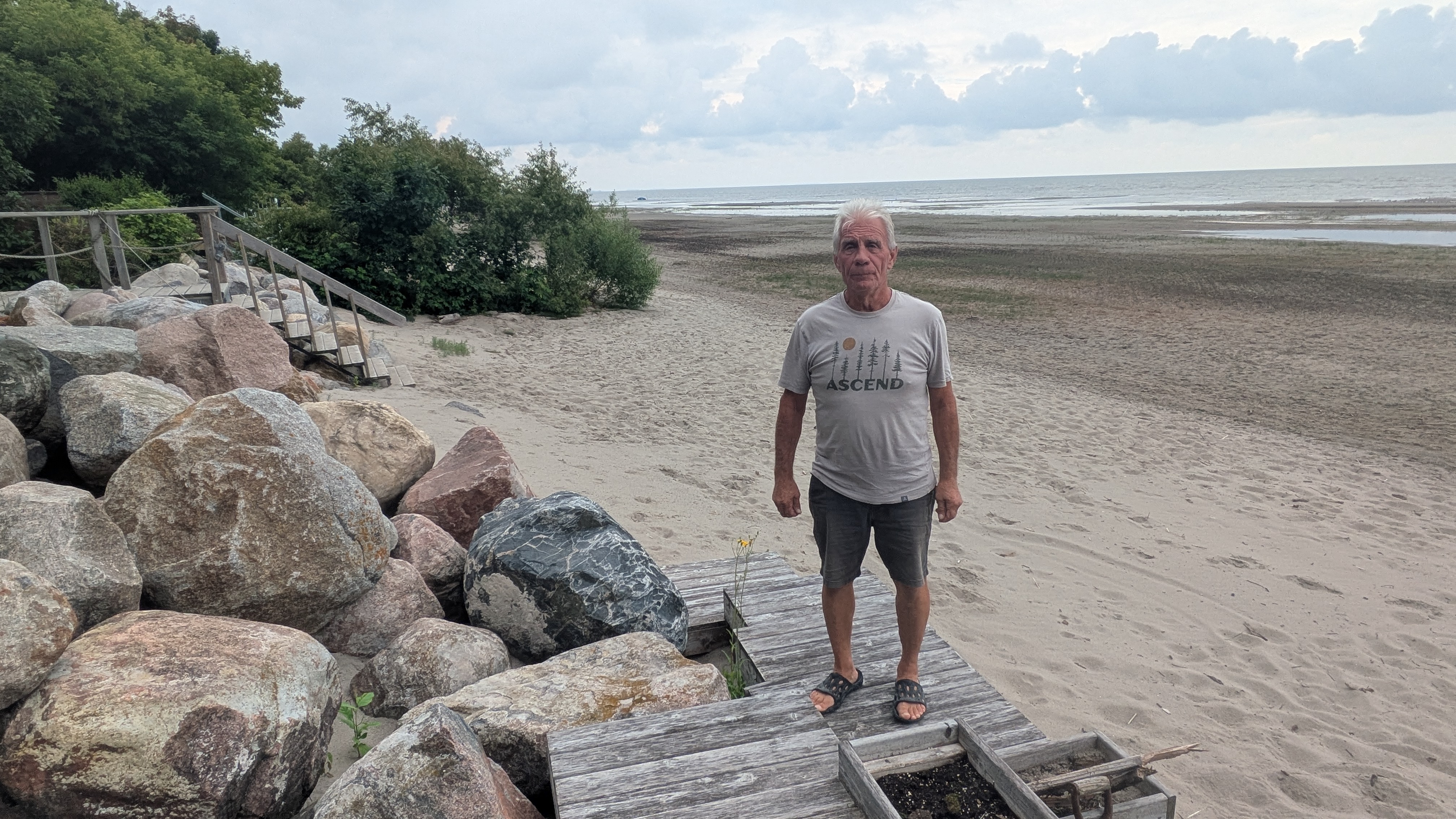 Rick Henderson standing on beach at Delta Beach