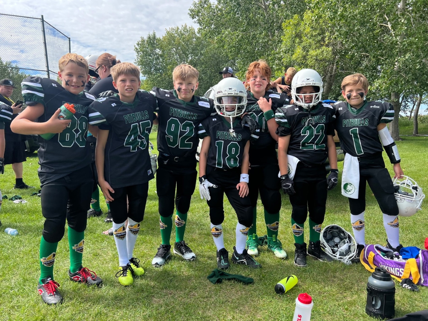Several members of the Portage Pitbulls in their uniforms