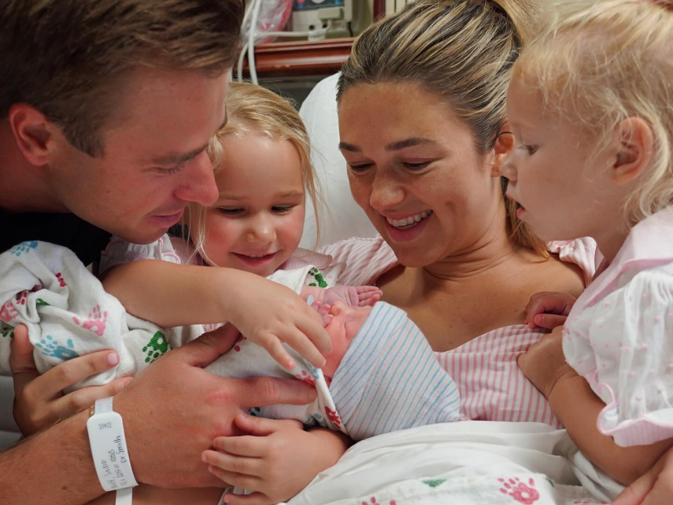 Sadie Robertson Huff, her husband Chris and their three girls