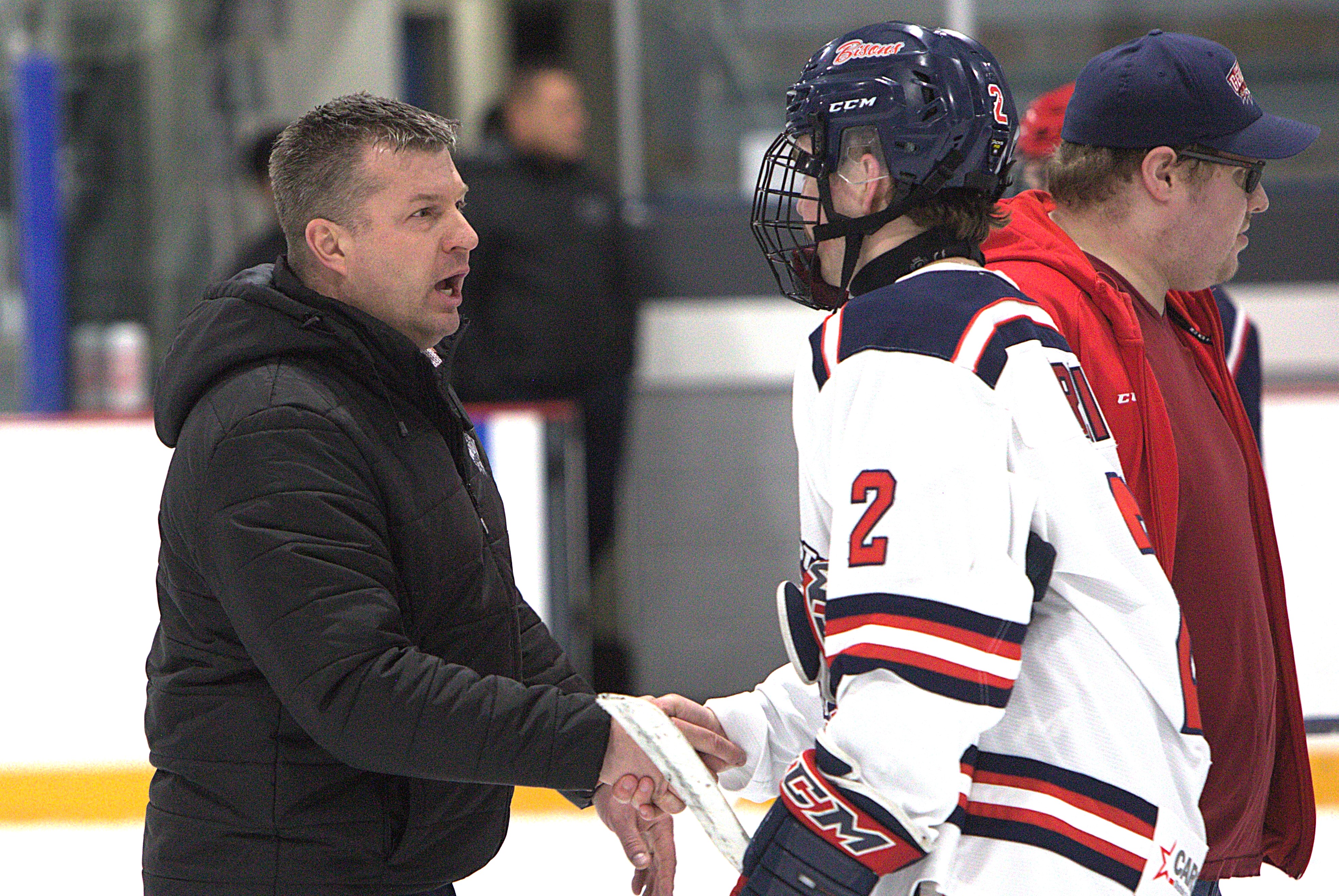 Gens coach Derek Bell, Okotoks Bison Avery Greig