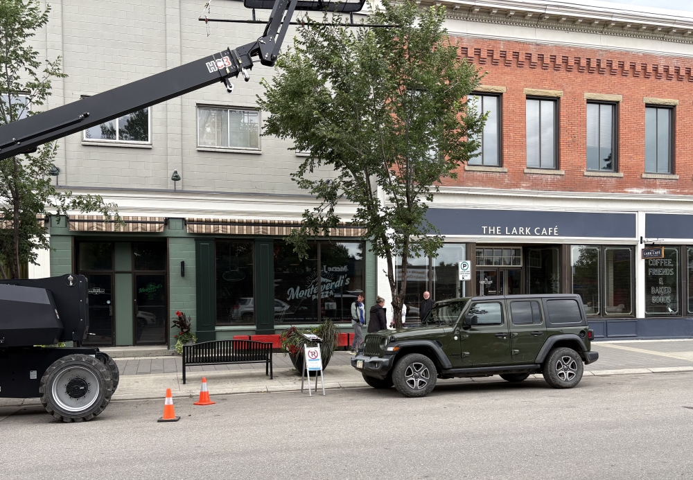 Film crews in High River on August 8.