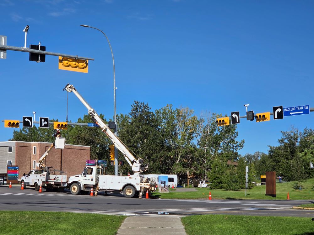 Traffic light maintenance in High River. 