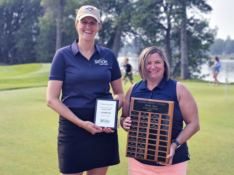Lindsey Jordan receiving her championship plaque from Julene Toews Dewis of Stride Credit Union at the Portage Ladies Open.