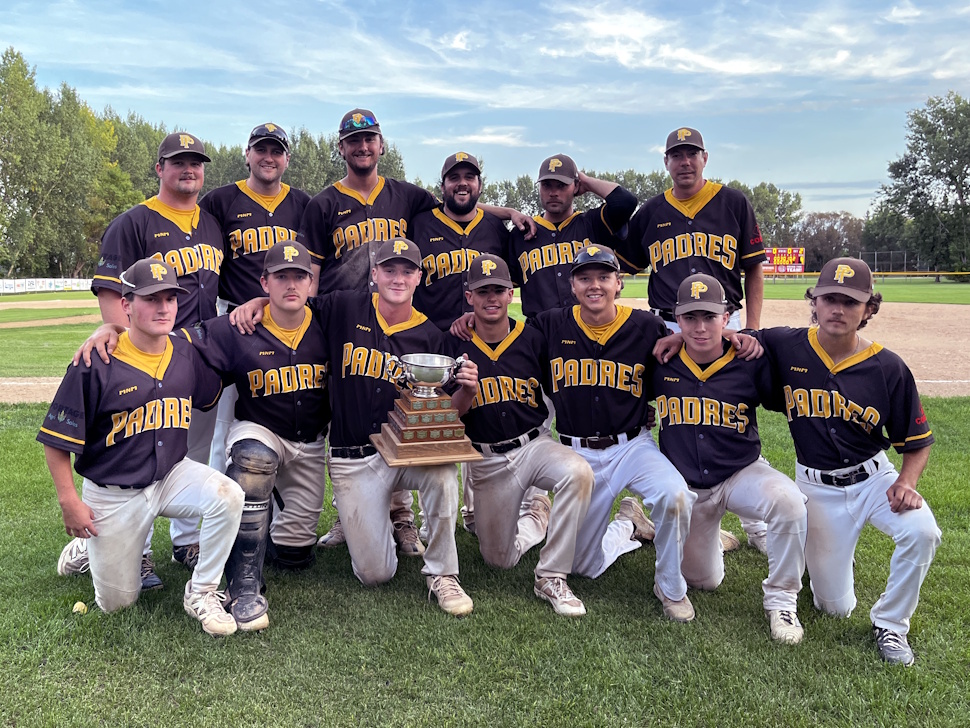 Group photo of the Portage Padres baseball team gathered on the field, smiling and holding the Santa Clara Baseball League championship trophy after their 7–6 win over the Plumas Pirates.