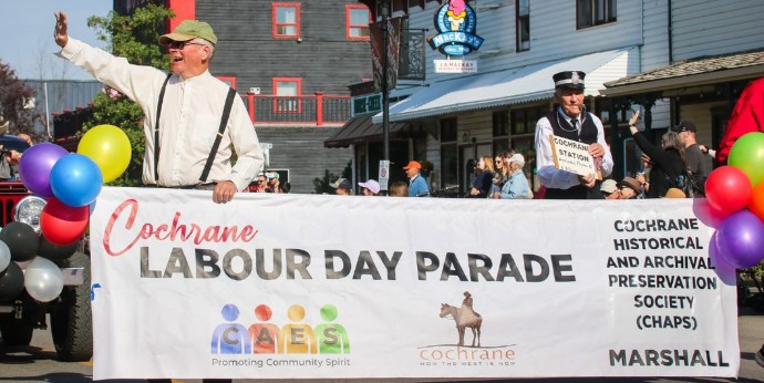 parade marshal chaps occhrane parade happy crowd smile wave