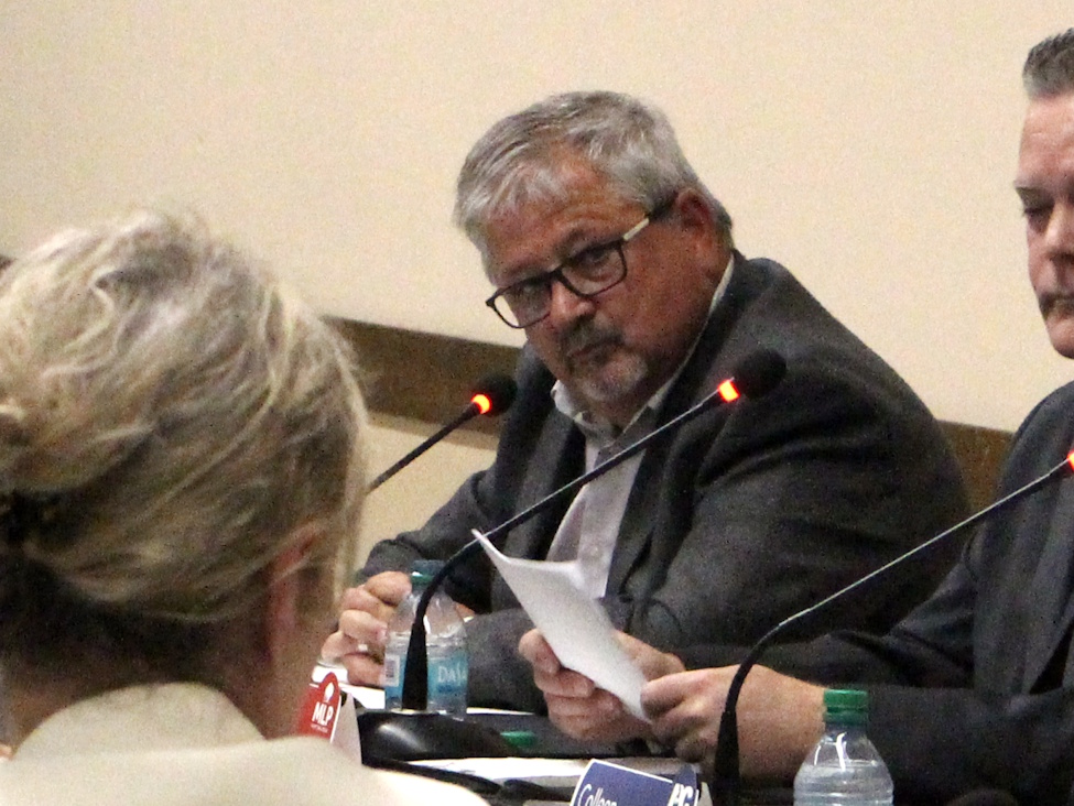 NDP Candidate for Spruce Woods, Ray Berthelette listens to the panel's question at the Spruce Woods Community Hall debate