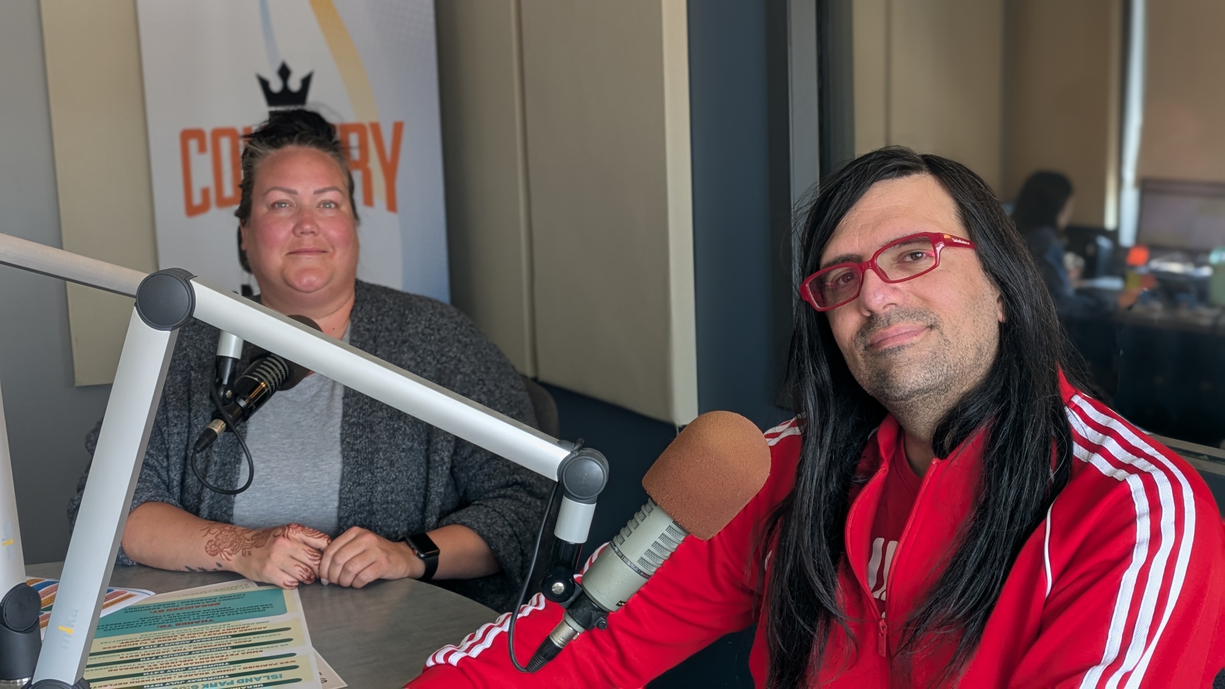 Shaye Lernowich and Randy Lilley in the studio behind the mics