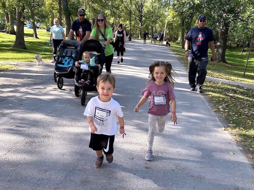 Children running along a 5-kilometre route during last year’s Terry Fox Run at Island Park in Portage la Prairie.