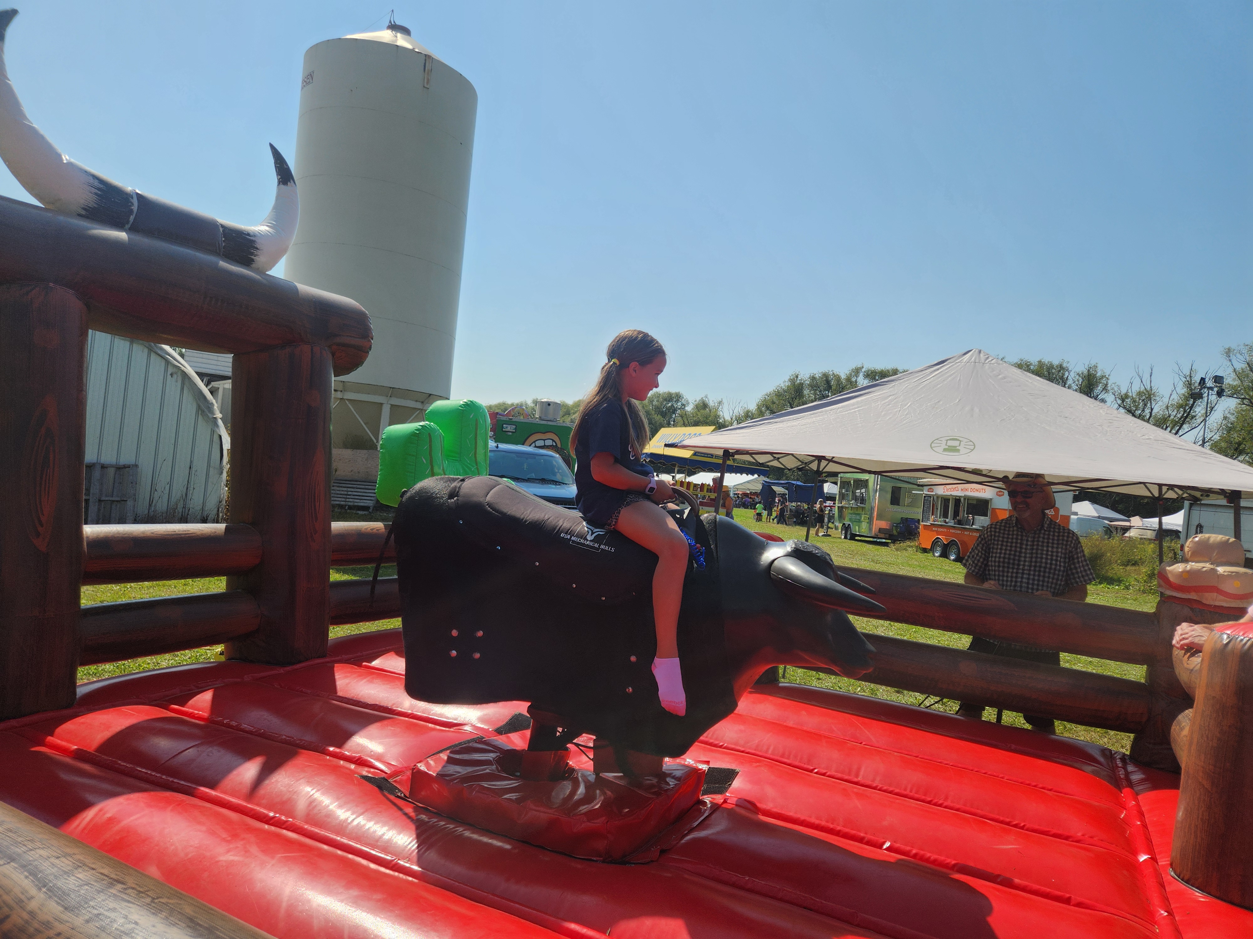Kids and adults took their turns on the bull. PortageOnline/ Tristen Sokolosky