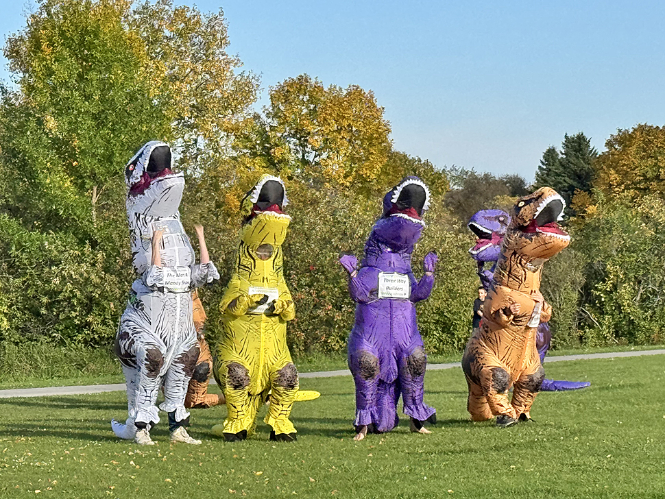 Inflatable Dino's line up for the Dino Dash race at the AD Penner Park in Steinbach on Saturday.