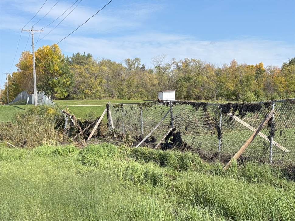 Fencing on the west side of the MHV pond collapsed due to last weeks heavy rainfall. Maintenance crews have done a temporary fix.