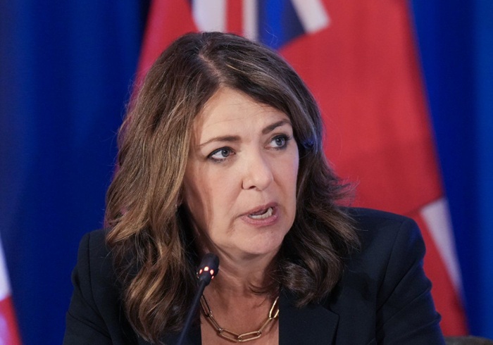 Alberta Premier Danielle Smith answers a question from the media during the 2025 summer meetings of Canada’s Premiers at Deerhurst Resort in Huntsville, Ont., on Wednesday, July 23, 2025. THE CANADIAN PRESS/Nathan Denette