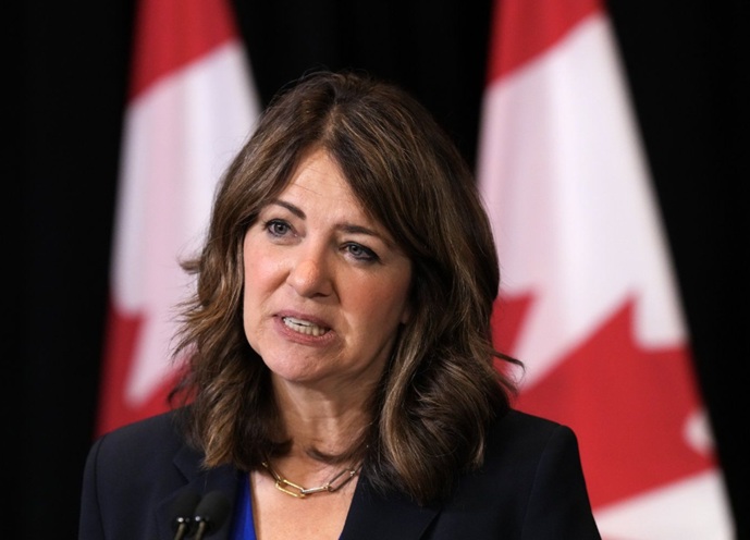 Alberta Premier Danielle Smith speaks to the media after signing a memorandum of understanding with Ontario and Saskatchewan during the 2025 summer meetings of Canada's Premiers at Deerhurst Resort in Huntsville, Ont., on Tuesday, July 22, 2025. THE CANADIAN PRESS/Nathan Denette Nathan Denette 