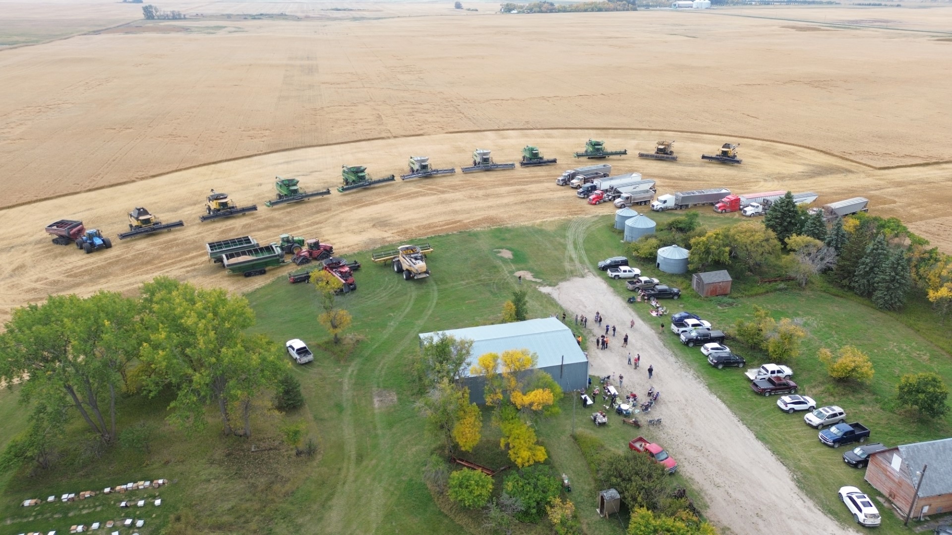 A DRONE PHOTO OF A FIELD BEING HARVESTED