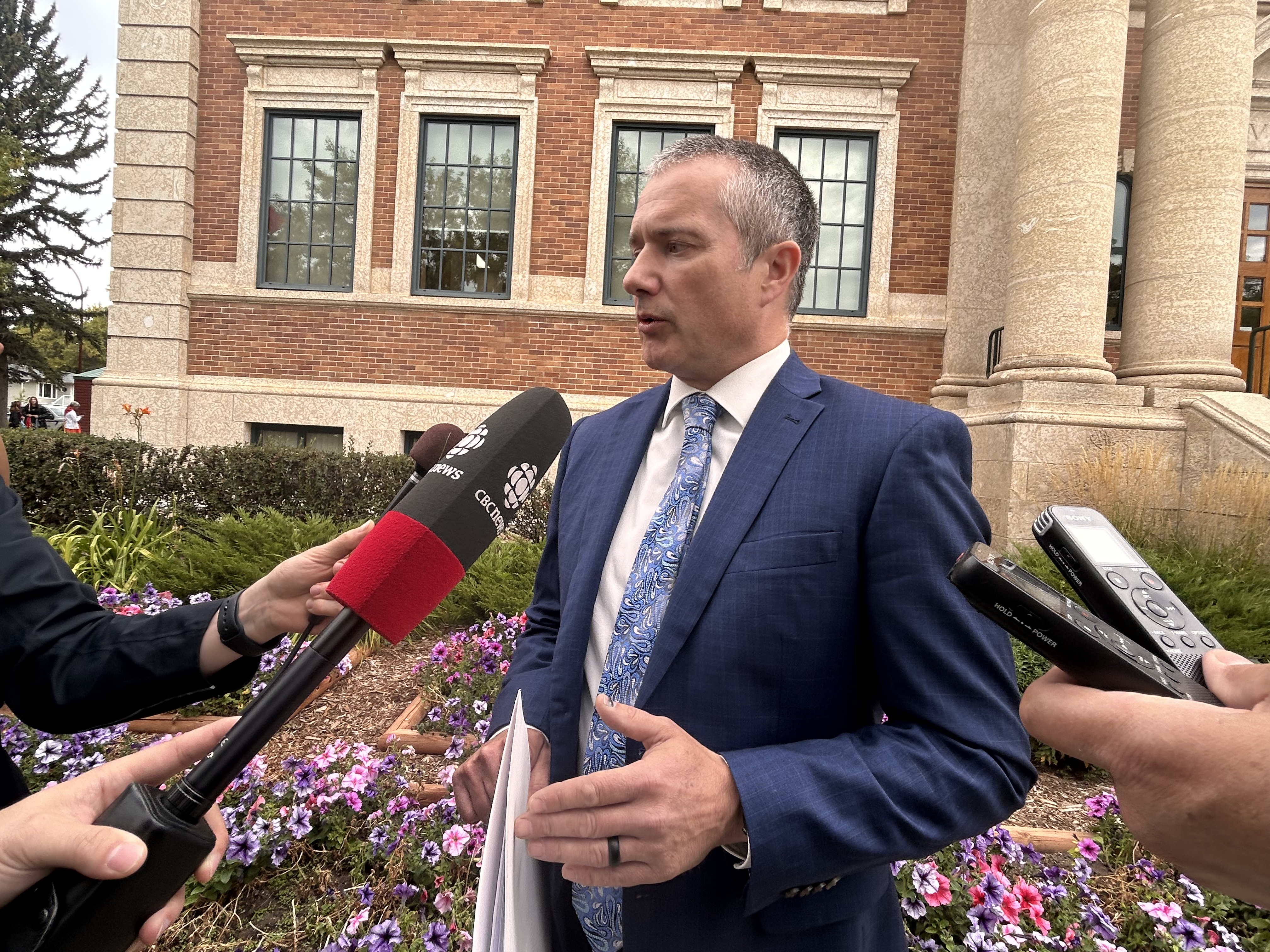 Crown Prosecutor Curtis Wiebe speaks to the media outside the Swift Current Provincial Court. (Photo by Shawn Mullin)