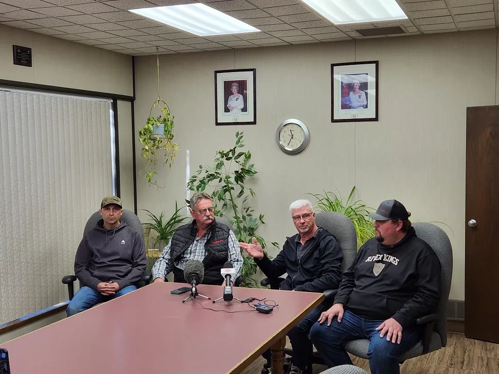 Brad Miller (second from the right) speaks at a media event with other local leaders. Aaron Wenzel, mayor of Leader (left) MLA Douge Steel (second from the left) and Sean Checkley, mayor of Fox Valley (right). (photo by Hayden Michaels)